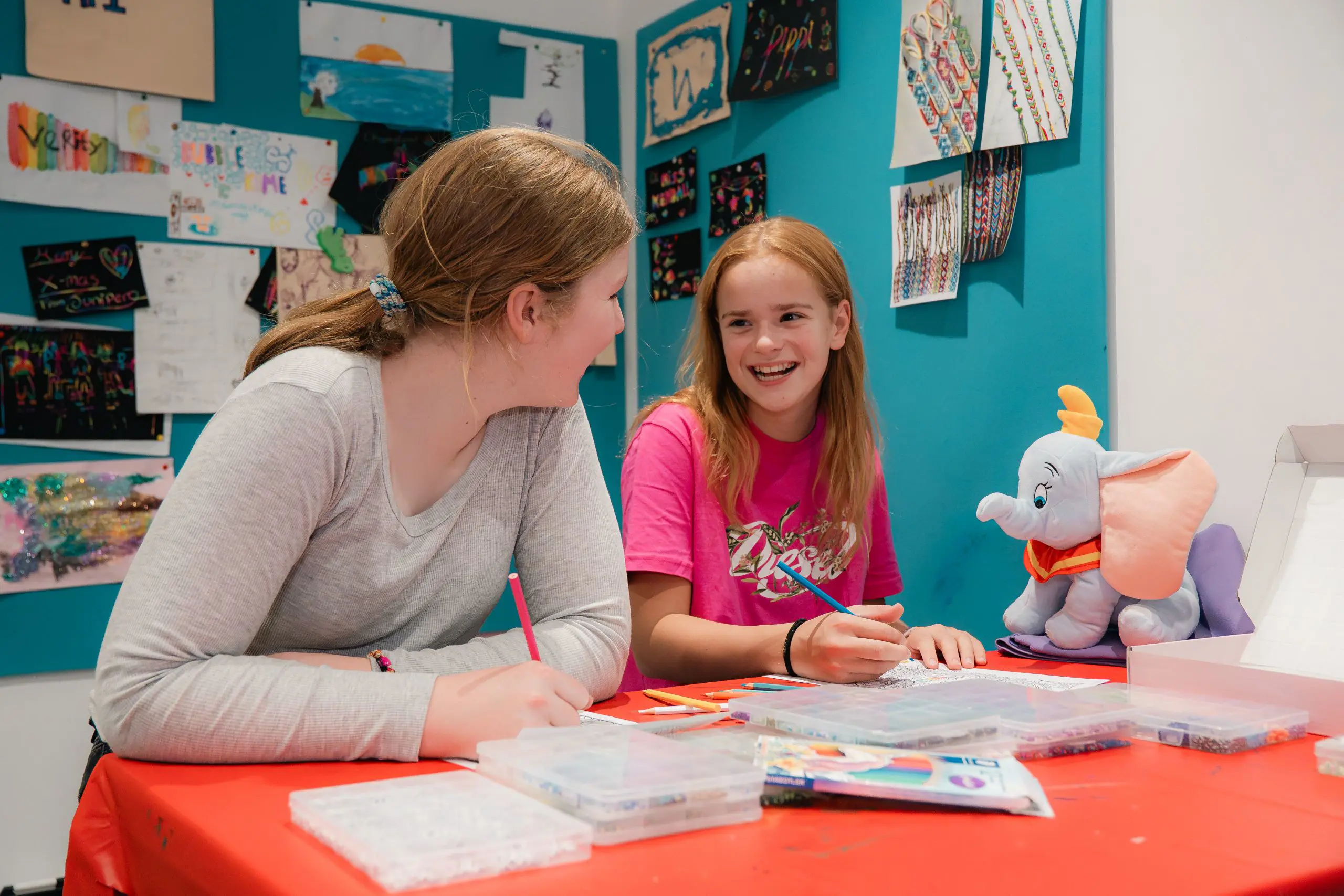 Teacher enjoying helping student