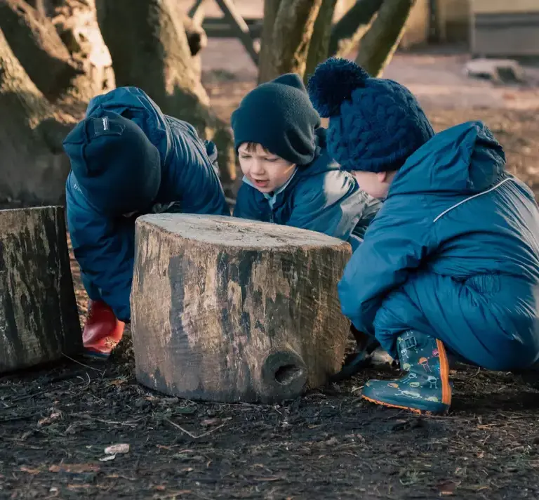 Young children playing outside