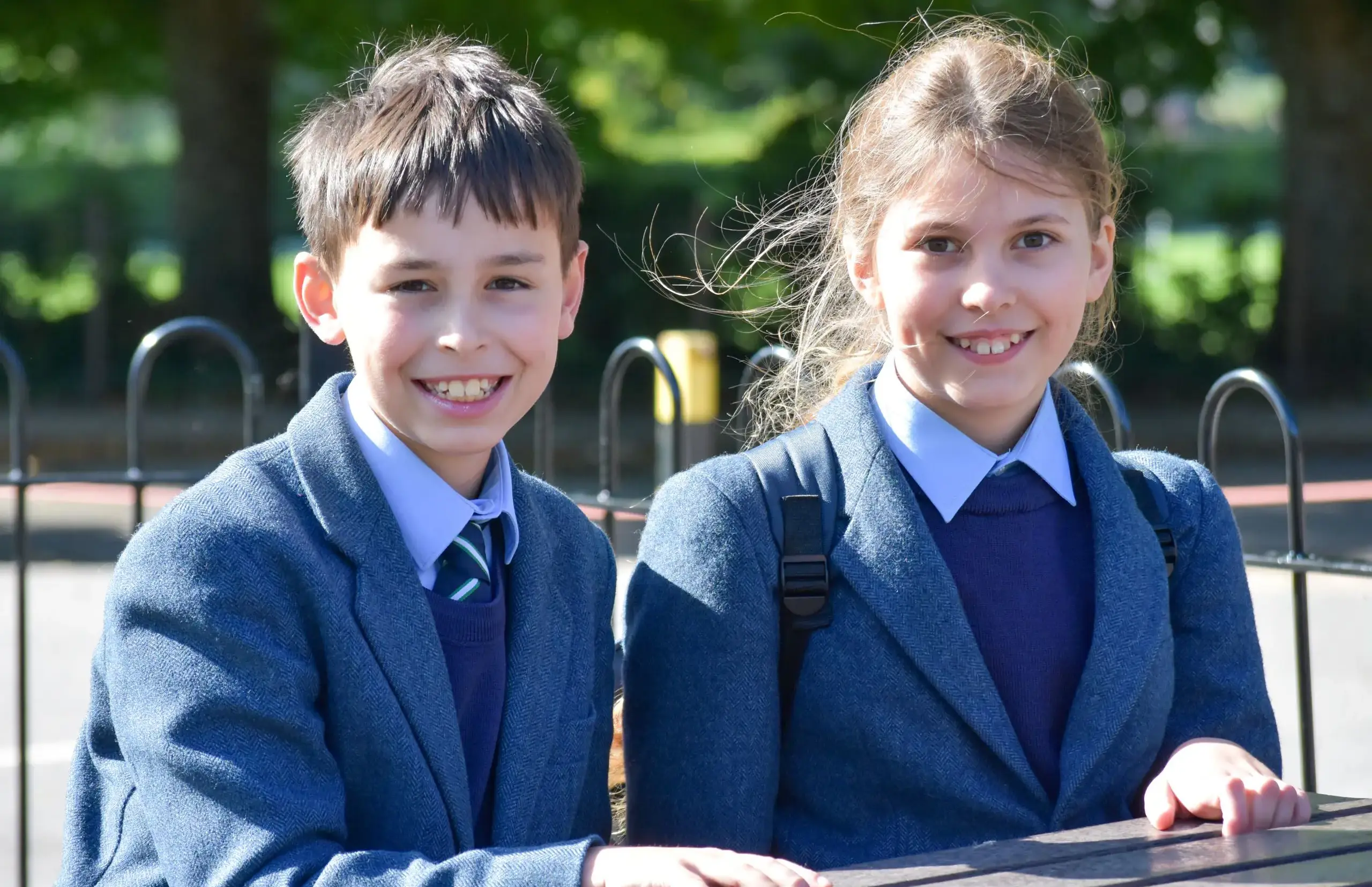 Two students sat outside