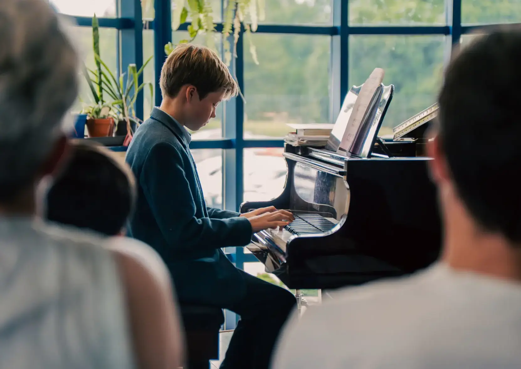 Boy playing piano
